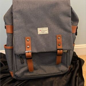Gray Canvas Backpack with Brown Accents